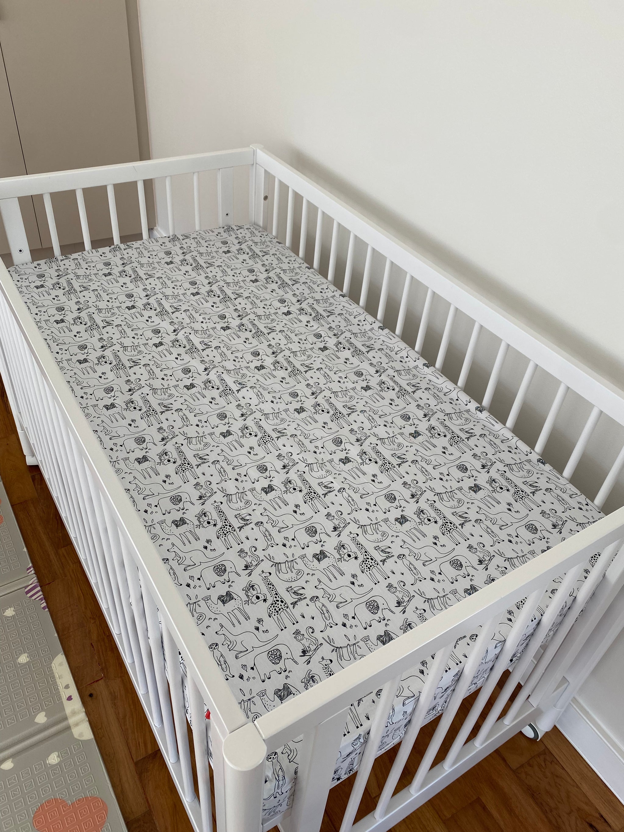 Lily trim and dan cot sheets